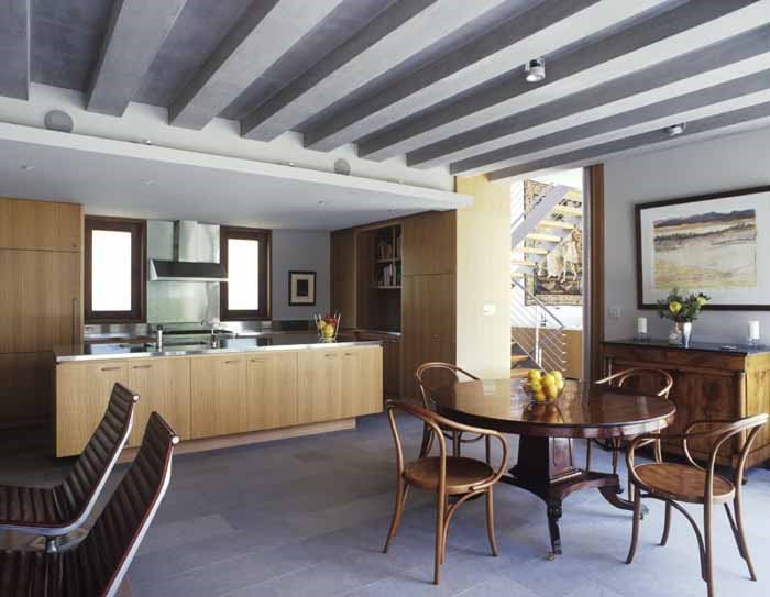 Concrete beams, limestone floors, timber finishes throughout the interiors
